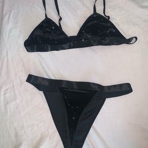 Black velvet two piece with silver stars and sparkle ascents. Just like new.